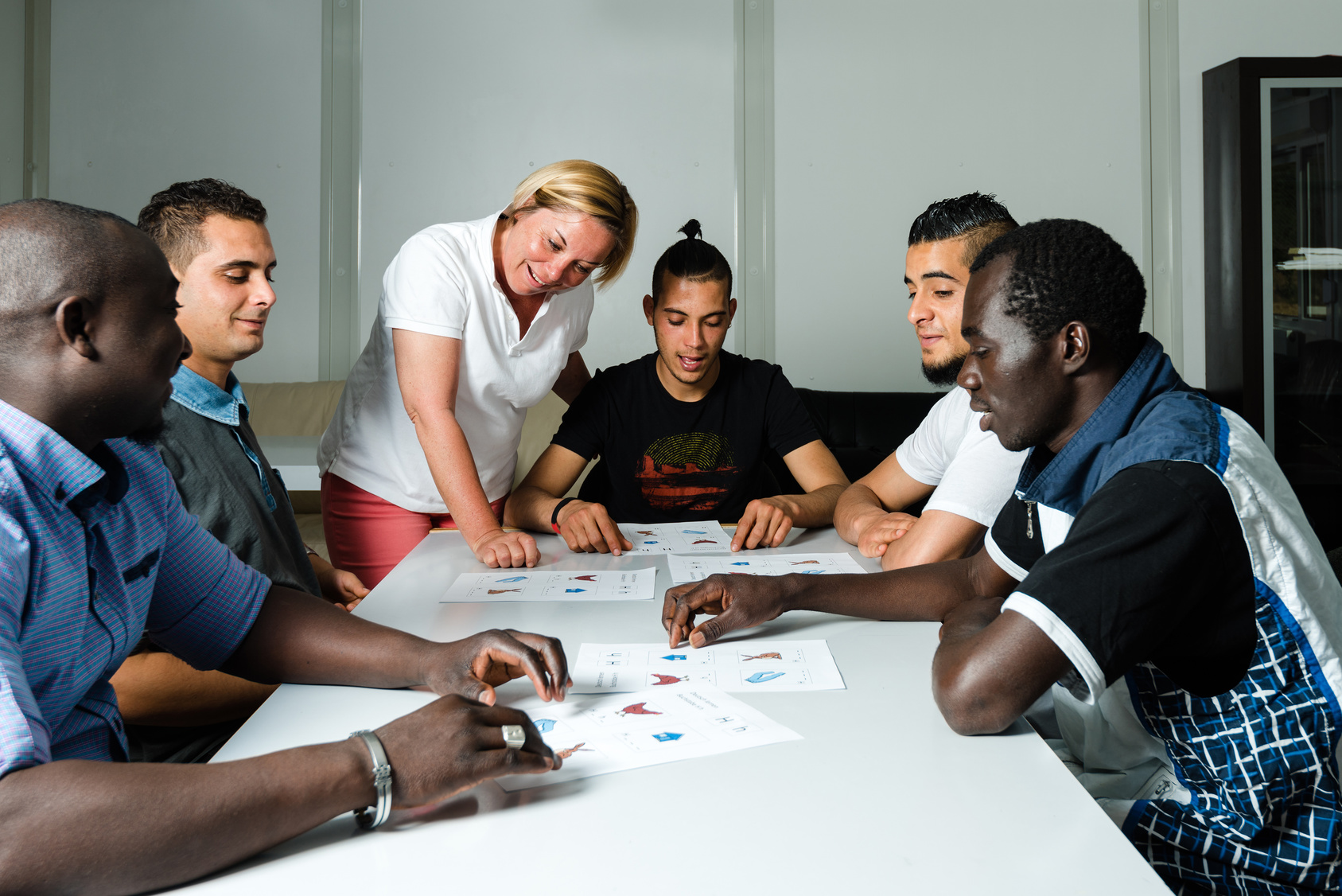Language training for refugees in a German camp Language training for refugees in a German camp